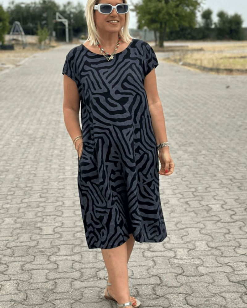 Nelia - Zomerjurk met ronde hals en mooie print