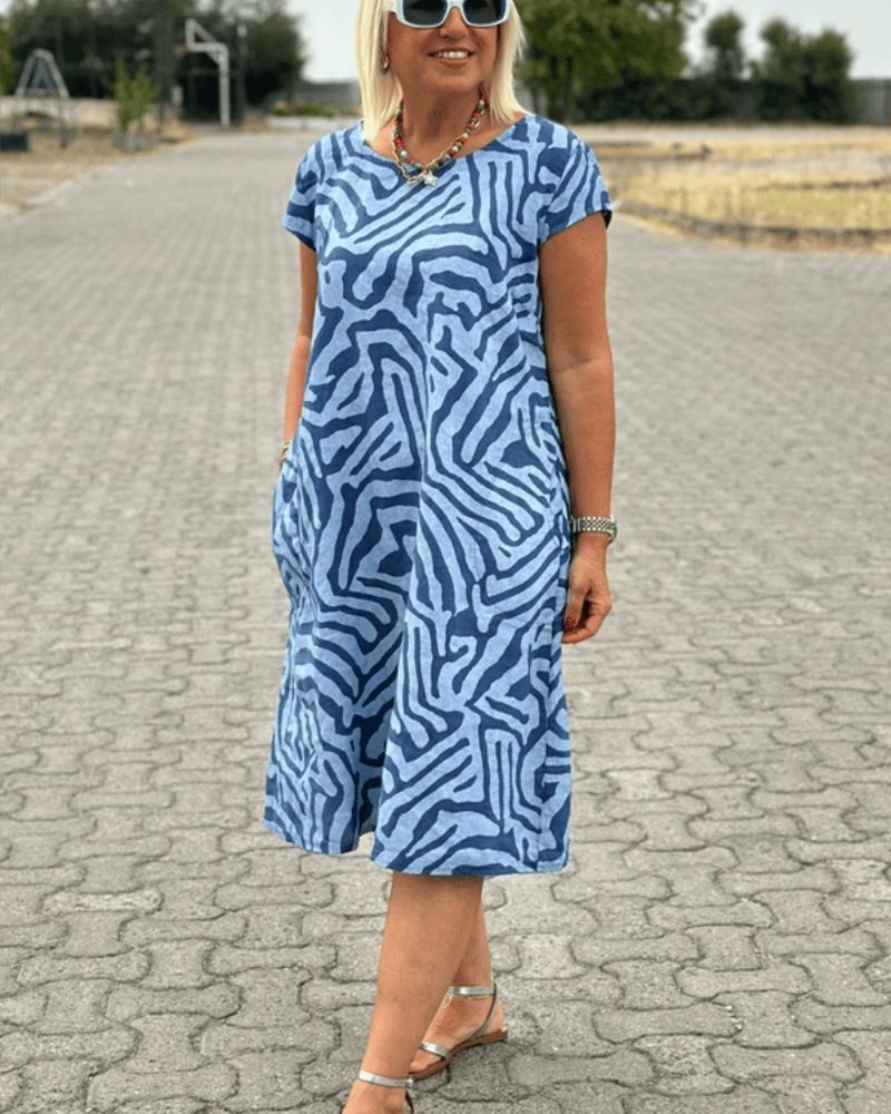 Nelia - Zomerjurk met ronde hals en mooie print