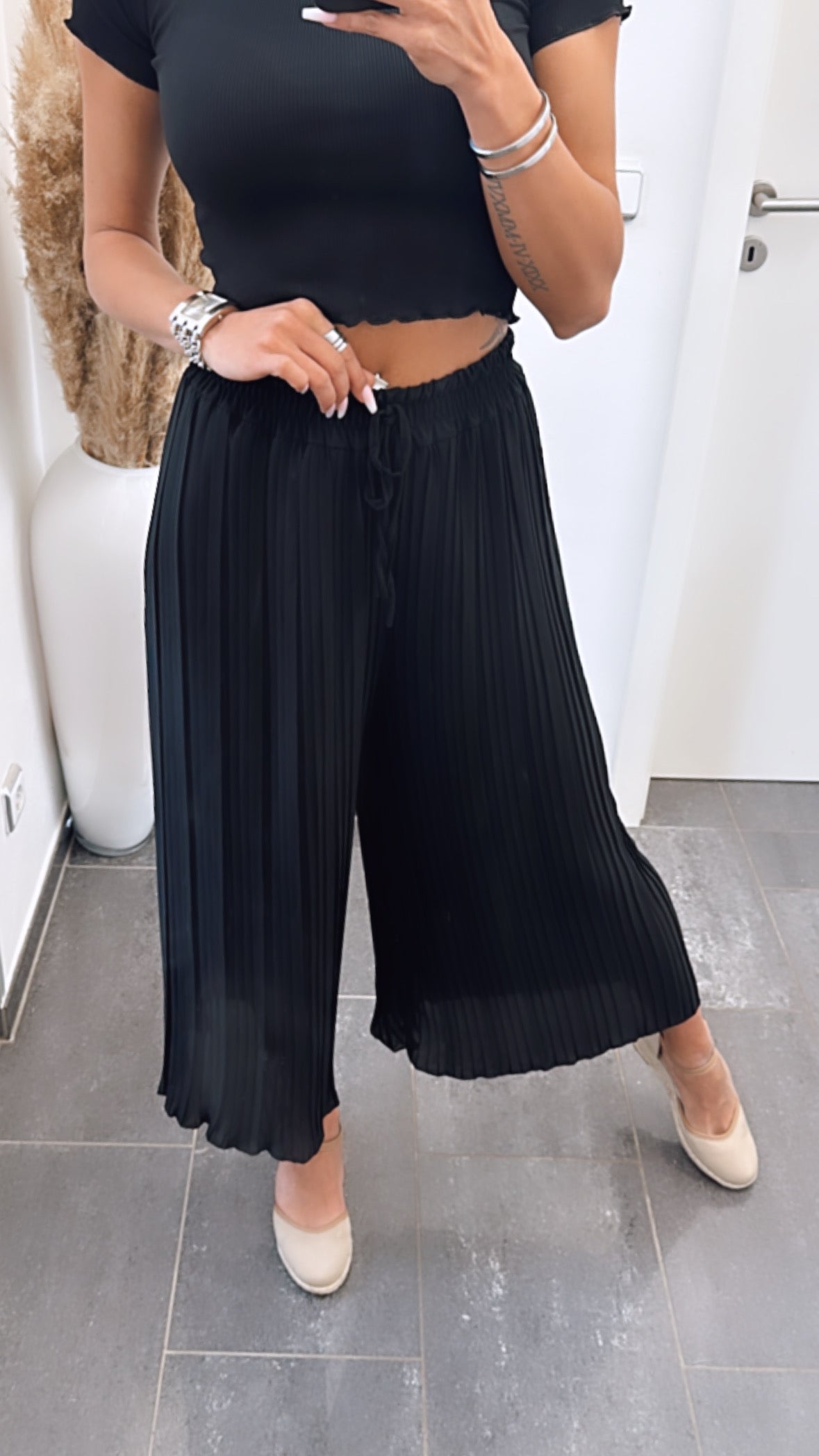 Geplooide broek