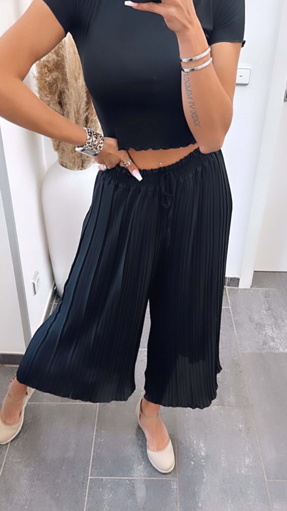 Geplooide broek