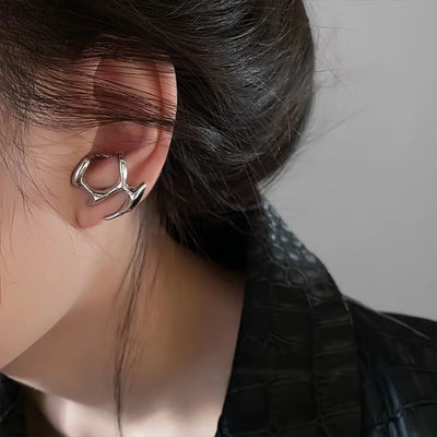 Astrielle - Stervormige zirkonia oorbellen met kruisdetail