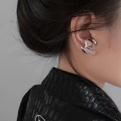 Astrielle - Stervormige zirkonia oorbellen met kruisdetail