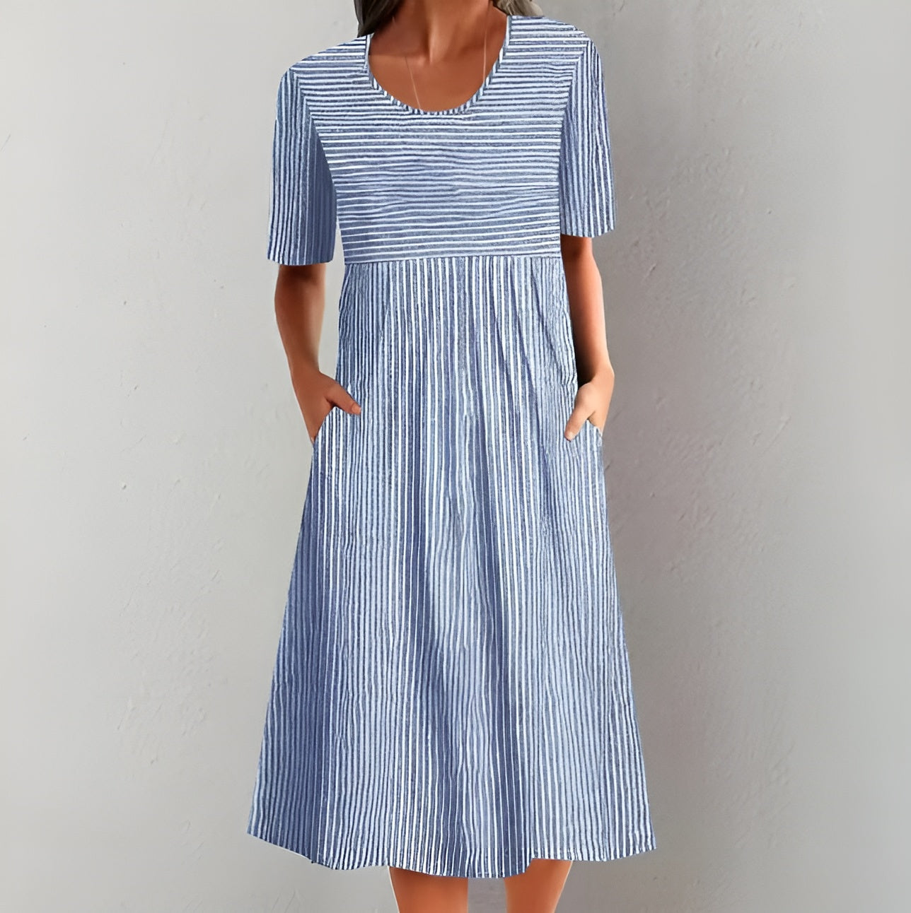 Annika | Elegante gestreepte midi-jurk met een door de zee geïnspireerde uitstraling