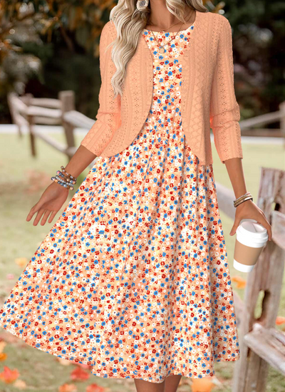 Oranje jurk met bloemenprint en lange mouwen en vestje