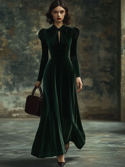 Juliette – Maxi-jurk van fluweel met opstaande kraag en strikdetail