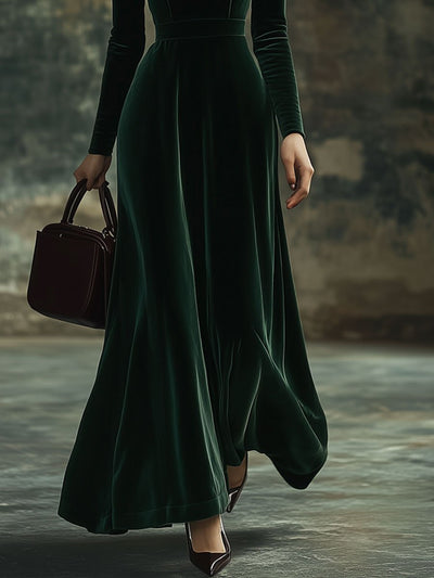 Juliette – Maxi-jurk van fluweel met opstaande kraag en strikdetail